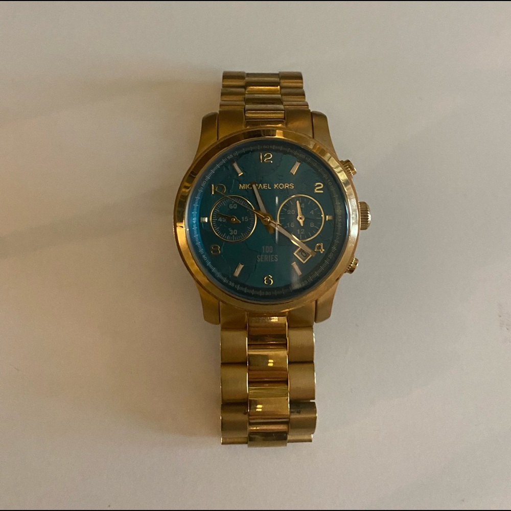 Hunger stop Michael Kors turquoise watch